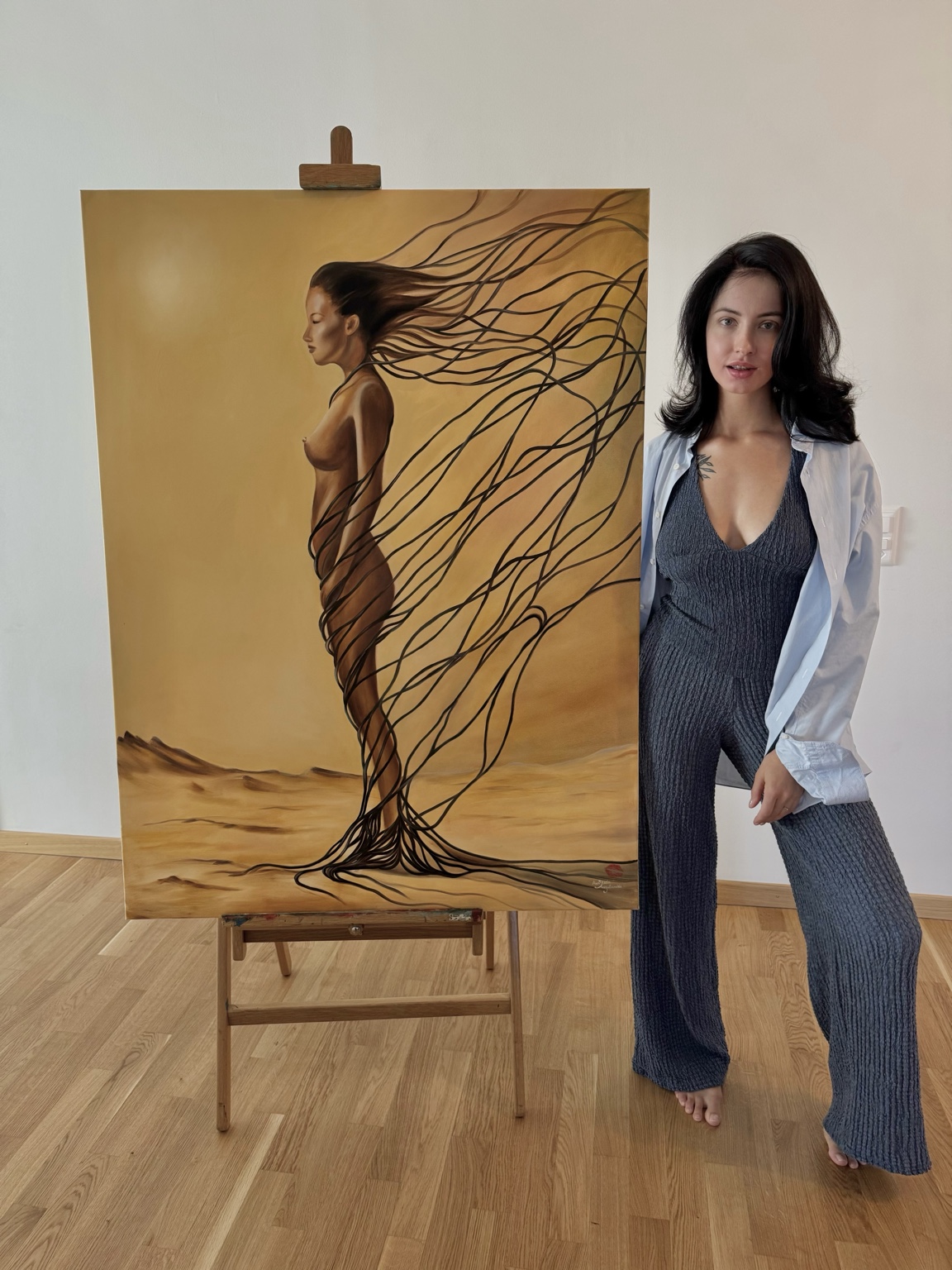 Anastasia Surgutanova with artwork